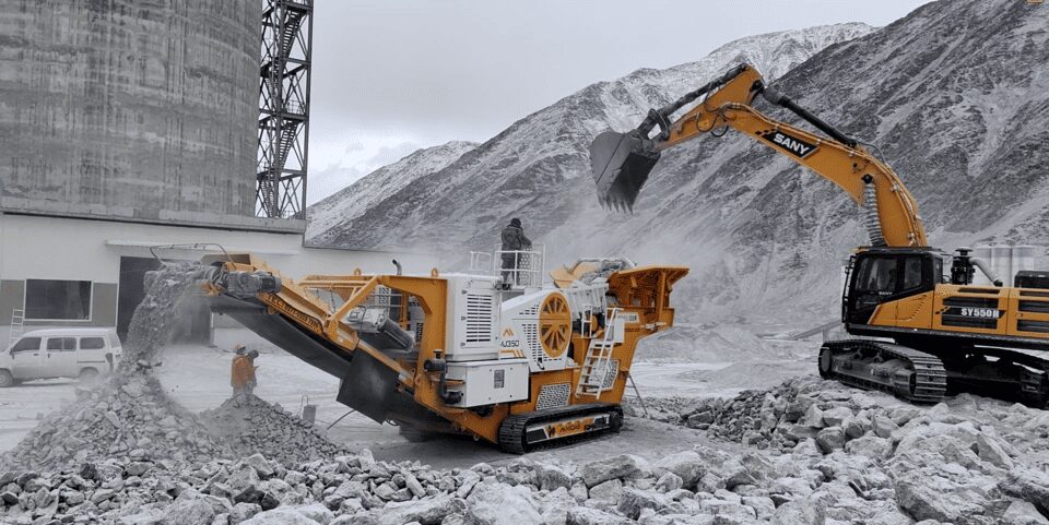 Site conditions for mobile crushers Mobile crusher on a dusty, remote construction site